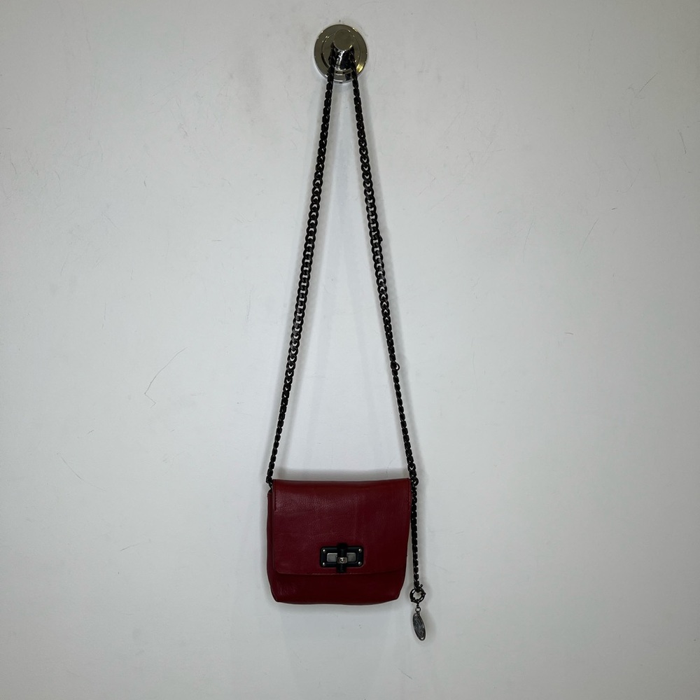 Lanvin burgundy leather purse with heavy cross body chain.